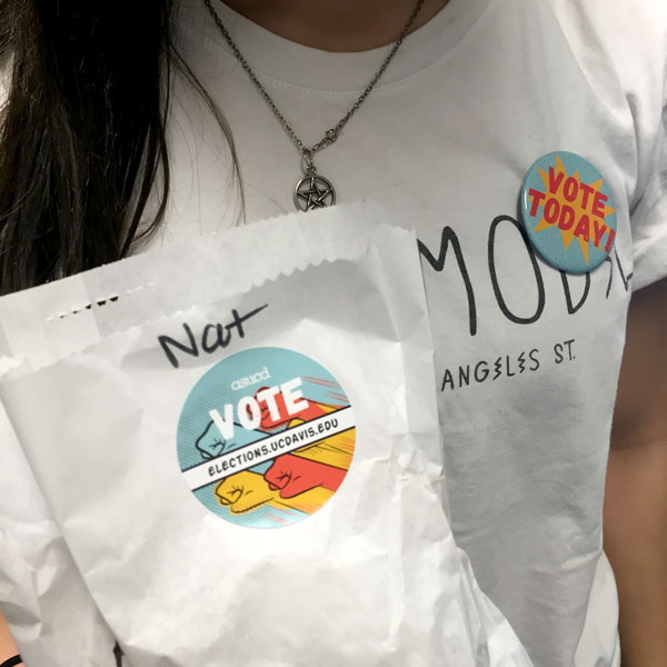 Vote Today pin and pastry bag